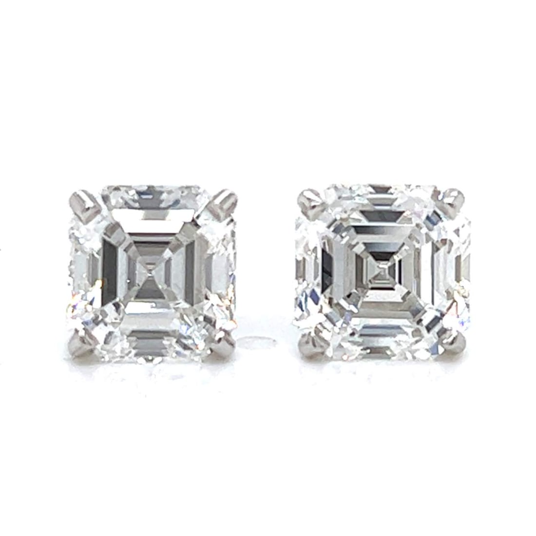 14K White Gold GIA Certified 3.27 Ct & 2.68 Ct Ascher-cut Diamond Studs: 14K White Gold GIA Certified 3.27 Ct & 2.68 Ct Ascher-cut Diamond Studs Elevate your elegance with these stunning 14K White Gold diamond stud earrings. Featuring two exquisite GIA Certified Ascher-cut