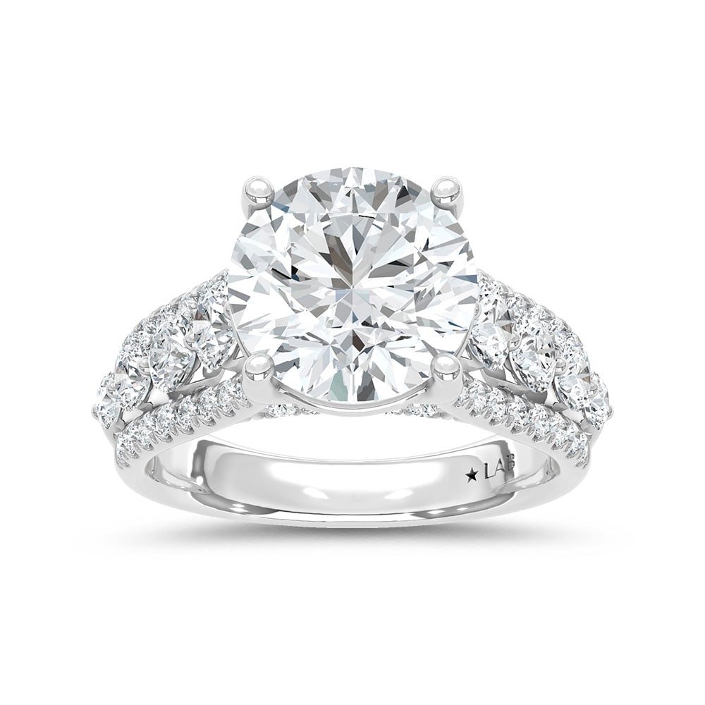 14K White Gold Lab Grown Diamond 6 1/5 Ct.Tw. Engagement Ring (Center 5ct): 14K White Gold Lab Grown Diamond 6 1/5 Ct.Tw. Engagement Ring (Center 5ct) 14k White Gold Stone Color: D-f Stone Clarity: Vs Each ring is presented in standard size 6.5. Complimentary resizing is avai