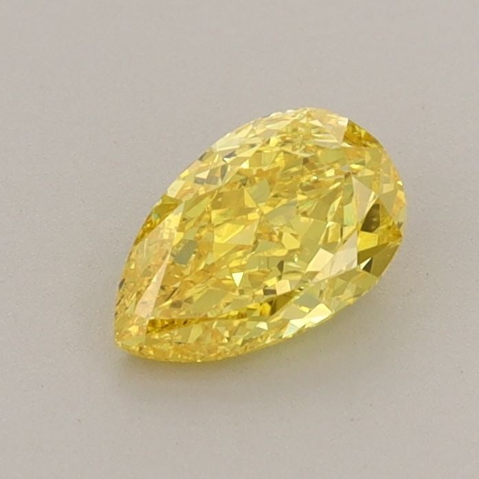 Loose Diamond - PEAR 0.64ct Fancy Vivid Yellow VVS2: Loose Diamond - PEAR 0.64ct Fancy Vivid Yellow VVS2 Source: This is a real non-mined Diamond that has been grown in a lab Shape: PEAR Carats: 0.64 Color: Fancy Vivid Yellow Certification: IGI Video: