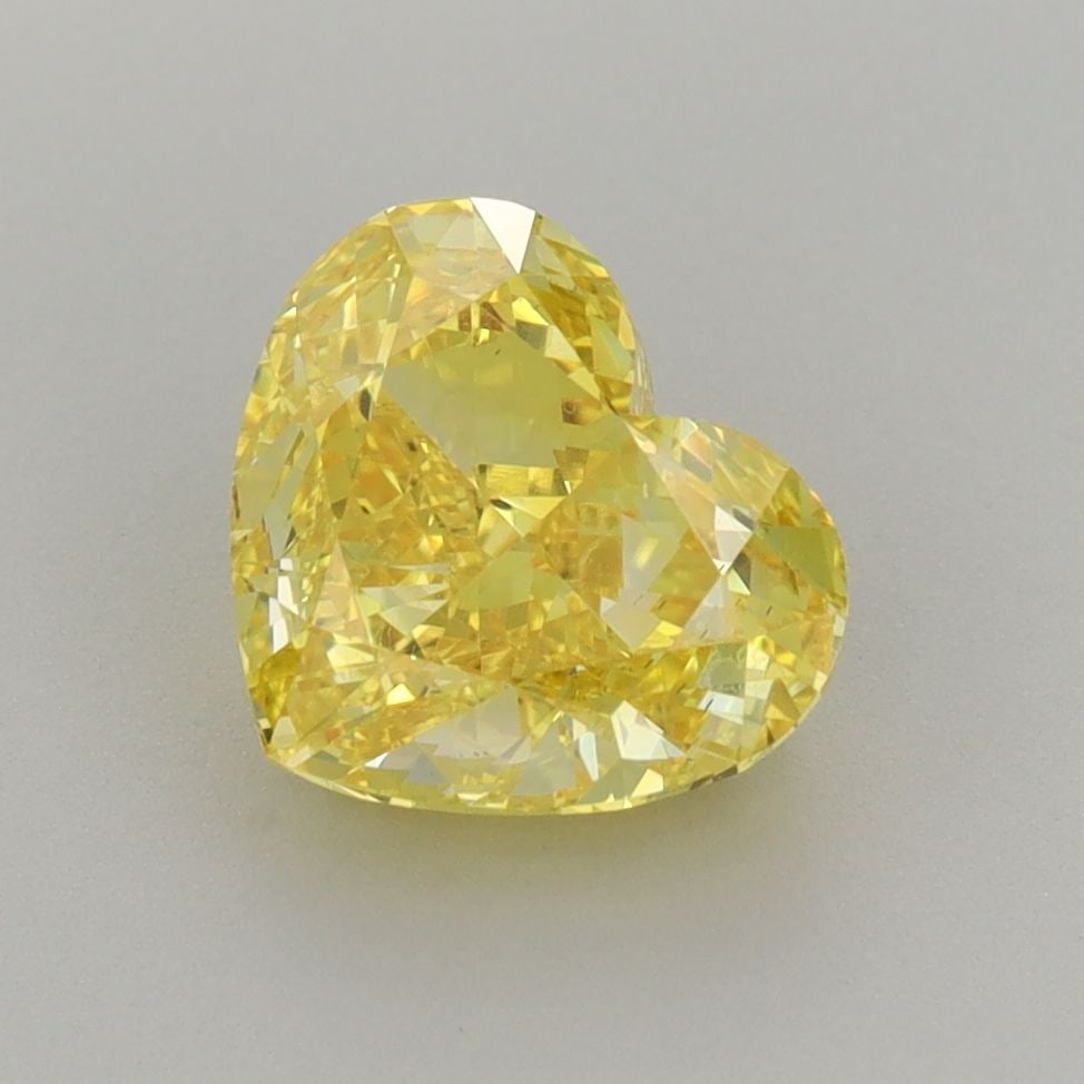 Loose Diamond - HEART 2.01ct Fancy Vivid Yellow VS2: Loose Diamond - HEART 2.01ct Fancy Vivid Yellow VS2 Source: This is a real non-mined Diamond that has been grown in a lab Shape: HEART Carats: 2.01 Color: Fancy Vivid Yellow Certification: IGI Video:
