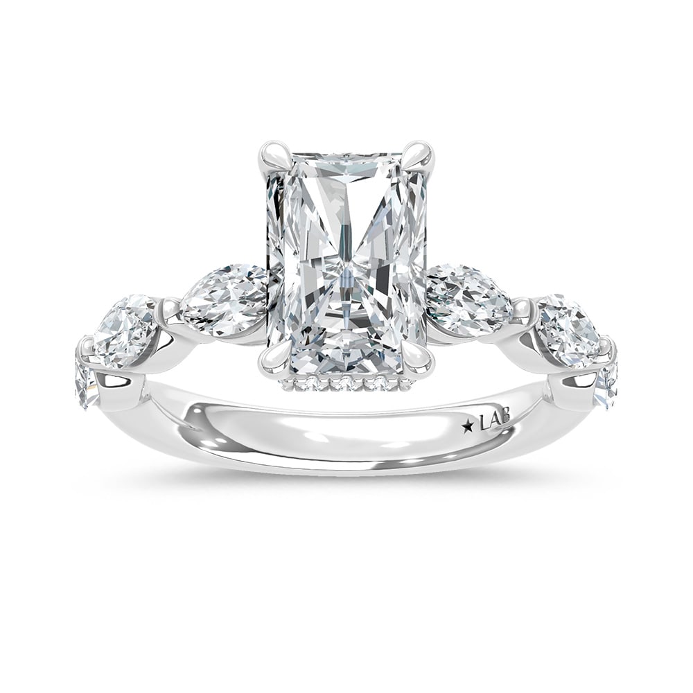 14K White Gold Lab Grown Diamond 3 7/8 Ct.Tw. Marquise and Round Engagement Ring (IGI Certified: 14K White Gold Lab Grown Diamond 3 7/8 Ct.Tw. Marquise and Round Engagement Ring (IGI Certified Center 3ct) 14k White Gold Stone Color: D-f Stone Clarity: Vs Each ring is presented in standard size 6.