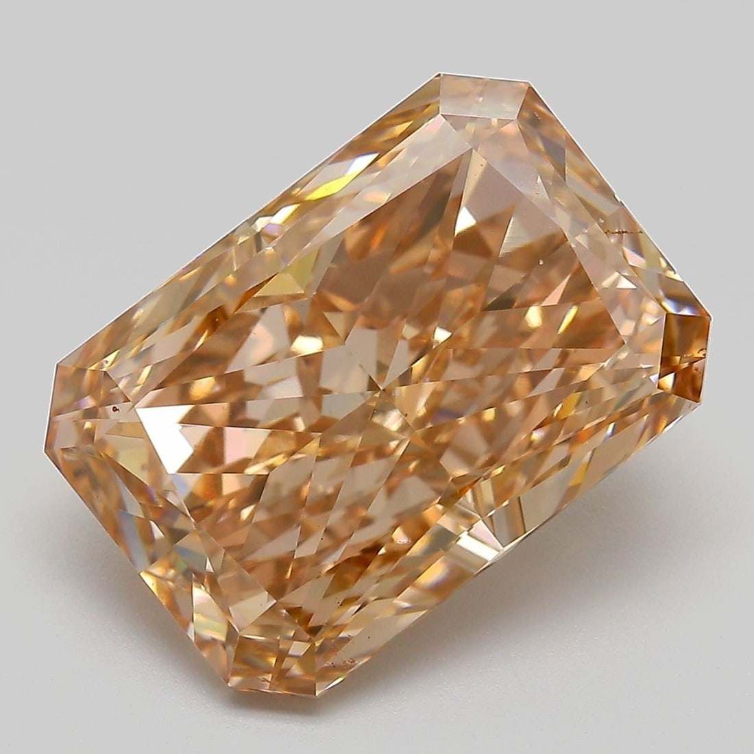 Loose Diamond - RADIANT 9.01ct Fancy Brown VS1: Loose Diamond - RADIANT 9.01ct Fancy Brown VS1 Source: This is a real non-mined Diamond that has been grown in a lab Shape: RADIANT Carats: 9.01 Color: Fancy Brown Certification: IGI The Diamond Depot