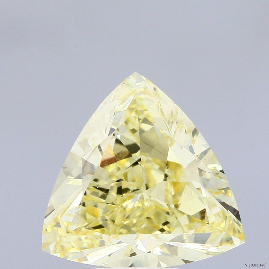 Loose Diamond - TRIANGULAR 5.04ct Fancy Yellow VS1: Loose Diamond - TRIANGULAR 5.04ct Fancy Yellow VS1 Source: This is a real non-mined Diamond that has been grown in a lab Shape: TRIANGULAR Carats: 5.04 Color: Fancy Yellow Certification: IGI Video: