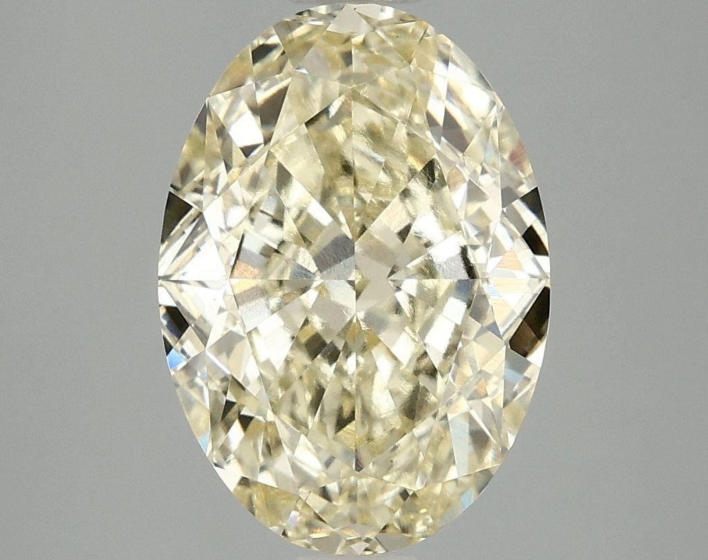 Loose Diamond - OVAL 4.1ct Fancy Yellow VS1: Loose Diamond - OVAL 4.1ct Fancy Yellow VS1 Source: This is a real non-mined Diamond that has been grown in a lab Shape: OVAL Carats: 4.1 Color: Fancy Yellow Certification: IGI Video:
