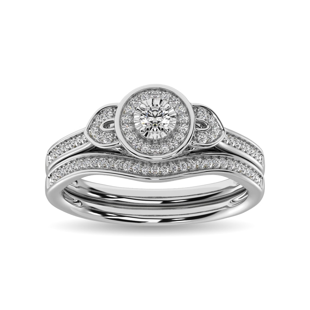 Diamond Bridal Ring 1/5 Ct.tw in Round-cut 10K White Gold: Diamond Bridal Ring 1/5 Ct.tw in Round-cut 10K White Gold A brilliant round center diamond is framed by additional round diamonds in this captivating ring in 10K white gold. The matching Wedding band,