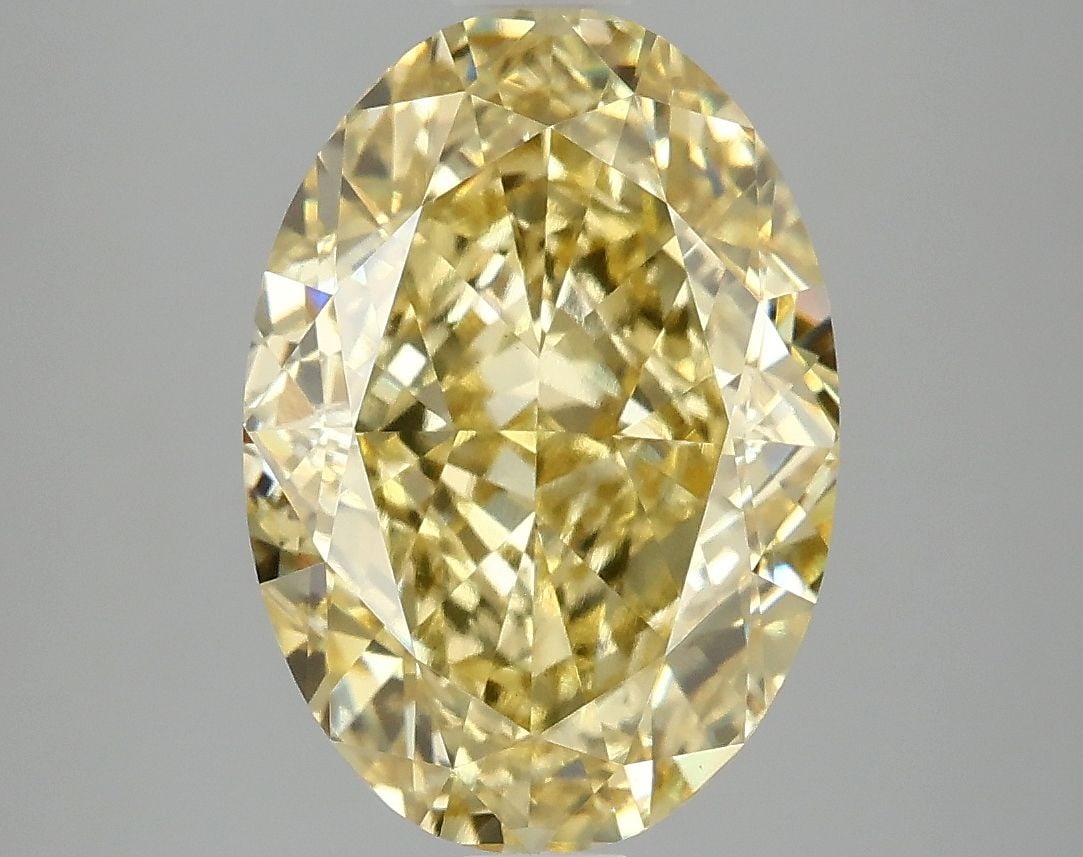 Loose Diamond - OVAL 5.1ct Fancy Intense Yellow VS1: Loose Diamond - OVAL 5.1ct Fancy Intense Yellow VS1 Source: This is a real non-mined Diamond that has been grown in a lab Shape: OVAL Carats: 5.1 Color: Fancy Intense Yellow Certification: IGI Video: