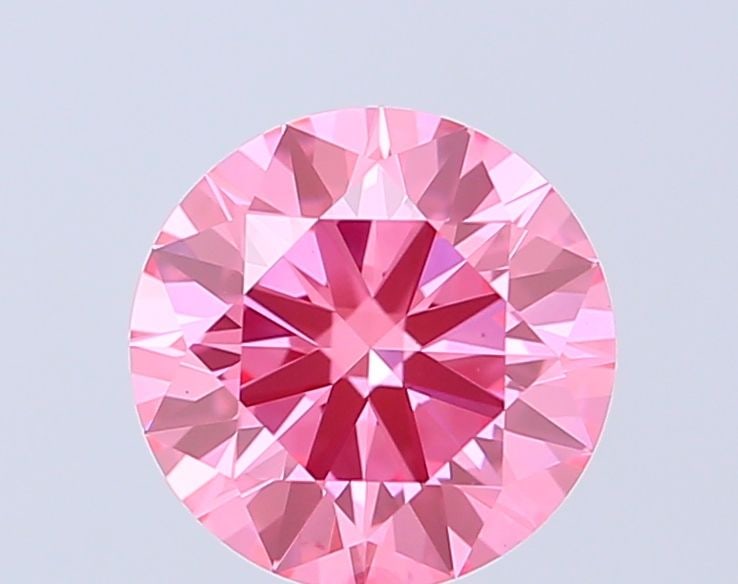 Ideal Loose Diamond - ROUND 1.4ct Fancy Vivid Pink VVS2: Ideal Loose Diamond - ROUND 1.4ct Fancy Vivid Pink VVS2 Source: This is a real non-mined Diamond that has been grown in a lab Shape: ROUND Carats: 1.4 Color: Fancy Vivid Pink Certification: IGI Video: