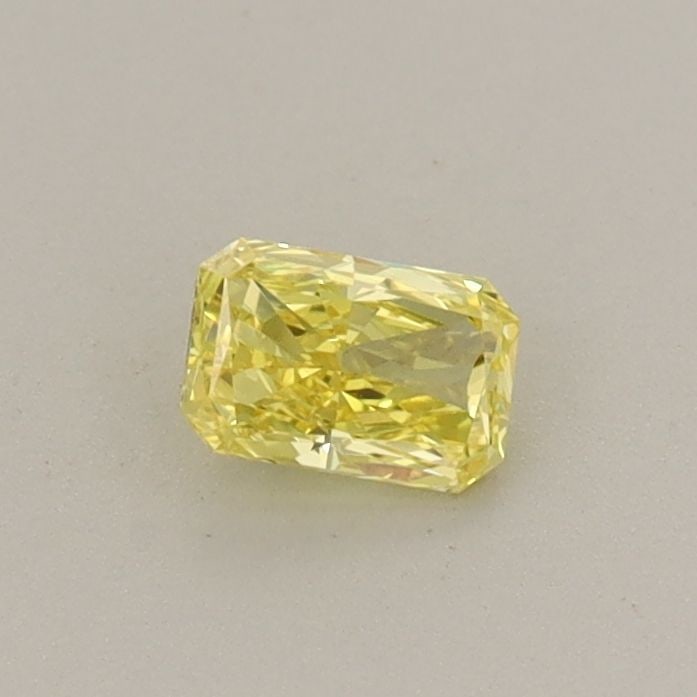 Loose Diamond - RADIANT 0.24ct Fancy Vivid Yellow VVS2: Loose Diamond - RADIANT 0.24ct Fancy Vivid Yellow VVS2 Source: This is a real non-mined Diamond that has been grown in a lab Shape: RADIANT Carats: 0.24 Color: Fancy Vivid Yellow Certification: IGI Vi