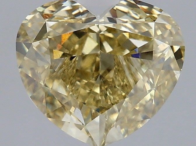 Loose Diamond - HEART 2.57ct Fancy Yellow VS1: Loose Diamond - HEART 2.57ct Fancy Yellow VS1 Source: This is a real non-mined Diamond that has been grown in a lab Shape: HEART Carats: 2.57 Color: Fancy Yellow Certification: IGI Video: