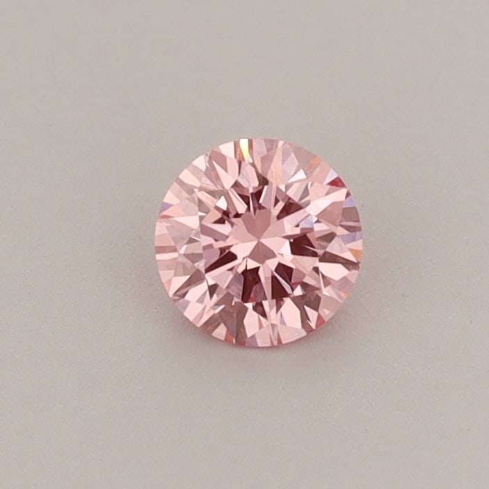 Loose Diamond - ROUND 0.24ct Fancy Vivid Pink VVS2: Loose Diamond - ROUND 0.24ct Fancy Vivid Pink VVS2 Source: This is a real non-mined Diamond that has been grown in a lab Shape: ROUND Carats: 0.24 Color: Fancy Vivid Pink Certification: IGI Video: