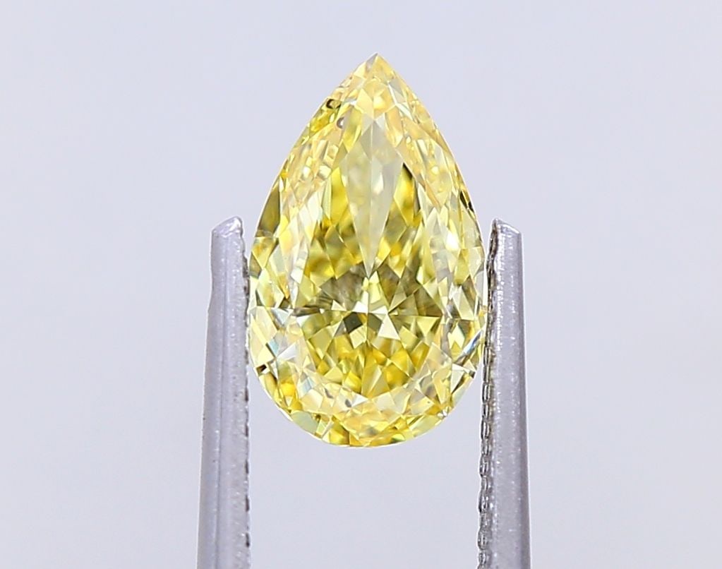 Loose Diamond - PEAR 1.08ct Fancy Intense Yellow VS2: Loose Diamond - PEAR 1.08ct Fancy Intense Yellow VS2 Source: This is a real non-mined Diamond that has been grown in a lab Shape: PEAR Carats: 1.08 Color: Fancy Intense Yellow Certification: IGI Video