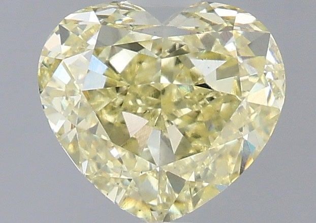 Loose Diamond - HEART 1.53ct Fancy Yellow VS2: Loose Diamond - HEART 1.53ct Fancy Yellow VS2 Source: This is a real non-mined Diamond that has been grown in a lab Shape: HEART Carats: 1.53 Color: Fancy Yellow Certification: IGI Video: