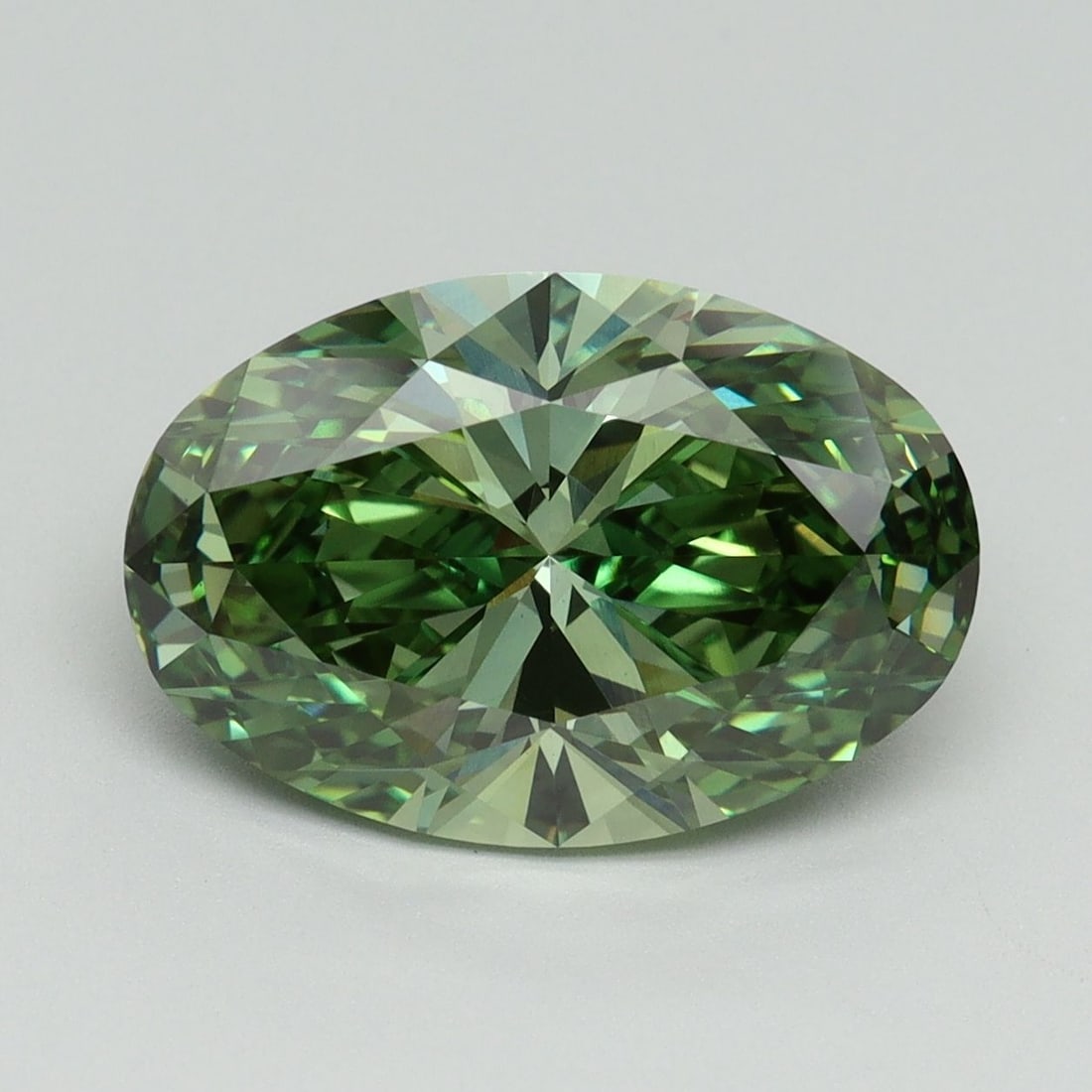 Loose Diamond - OVAL 4.11ct Fancy Vivid Green VS1: Loose Diamond - OVAL 4.11ct Fancy Vivid Green VS1 Source: This is a real non-mined Diamond that has been grown in a lab Shape: OVAL Carats: 4.11 Color: Fancy Vivid Green Certification: IGI Video: