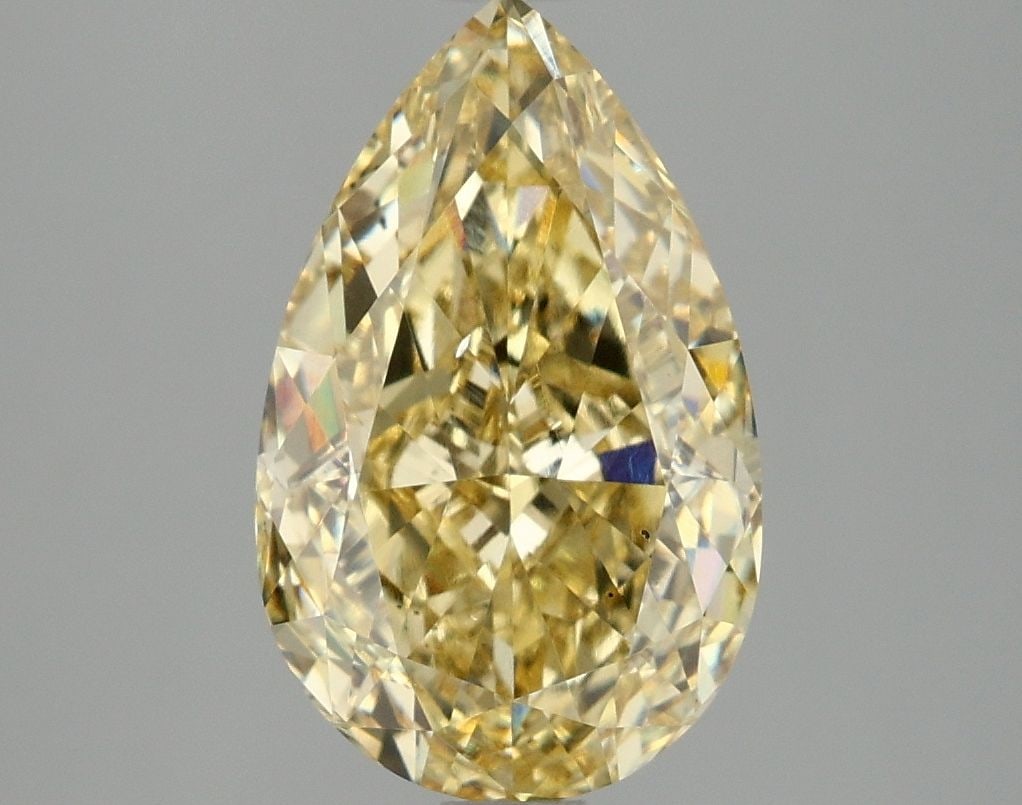 Loose Diamond - PEAR 3.03ct Fancy Intense Yellow VS2: Loose Diamond - PEAR 3.03ct Fancy Intense Yellow VS2 Source: This is a real non-mined Diamond that has been grown in a lab Shape: PEAR Carats: 3.03 Color: Fancy Intense Yellow Certification: IGI Video