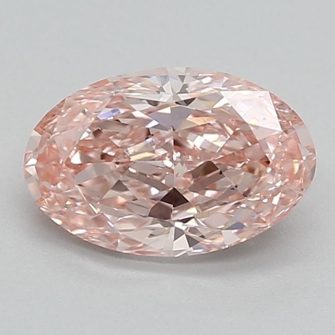 Loose Diamond - OVAL 0.87ct Fancy Vivid Pink VS2: Loose Diamond - OVAL 0.87ct Fancy Vivid Pink VS2 Source: This is a real non-mined Diamond that has been grown in a lab Shape: OVAL Carats: 0.87 Color: Fancy Vivid Pink Certification: NONE The Diamond 