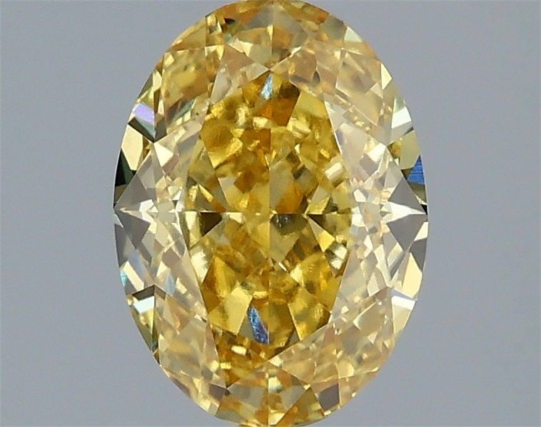 Loose Diamond - OVAL 2.08ct Fancy Vivid Yellow VVS2: Loose Diamond - OVAL 2.08ct Fancy Vivid Yellow VVS2 Source: This is a real non-mined Diamond that has been grown in a lab Shape: OVAL Carats: 2.08 Color: Fancy Vivid Yellow Certification: IGI Video: