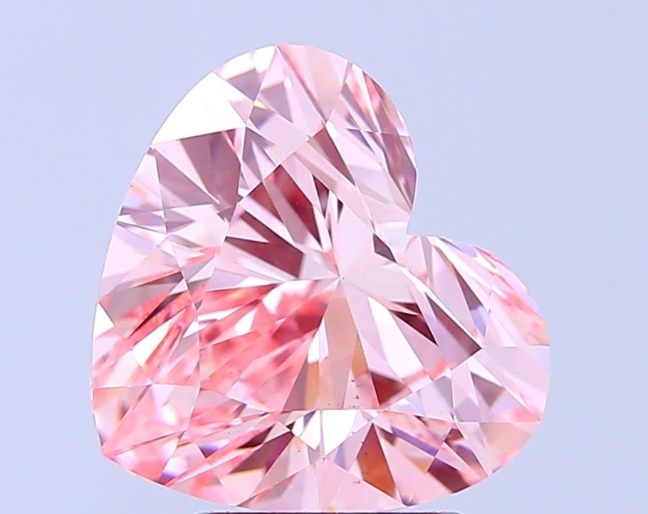 Loose Diamond - HEART 4.05ct Fancy Vivid Pink VS1: Loose Diamond - HEART 4.05ct Fancy Vivid Pink VS1 Source: This is a real non-mined Diamond that has been grown in a lab Shape: HEART Carats: 4.05 Color: Fancy Vivid Pink Certification: IGI Video: