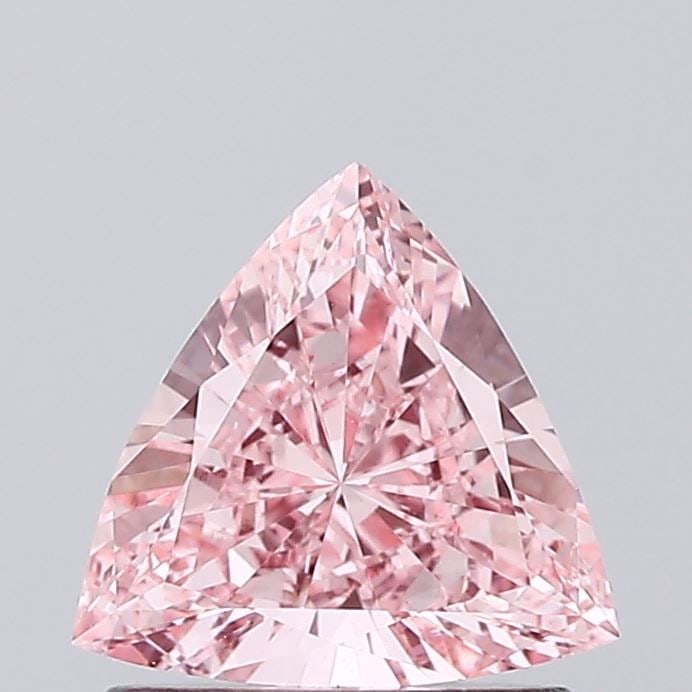 Loose Diamond - TRIANGULAR 0.68ct Fancy Vivid Pink VVS2: Loose Diamond - TRIANGULAR 0.68ct Fancy Vivid Pink VVS2 Source: This is a real non-mined Diamond that has been grown in a lab Shape: TRIANGULAR Carats: 0.68 Color: Fancy Vivid Pink Certification: IGI 