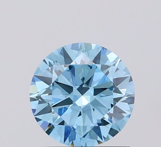 Loose Diamond - ROUND 1.01ct Fancy Vivid Blue VVS2: Loose Diamond - ROUND 1.01ct Fancy Vivid Blue VVS2 Source: This is a real non-mined Diamond that has been grown in a lab Shape: ROUND Carats: 1.01 Color: Fancy Vivid Blue Certification: NONE Video: