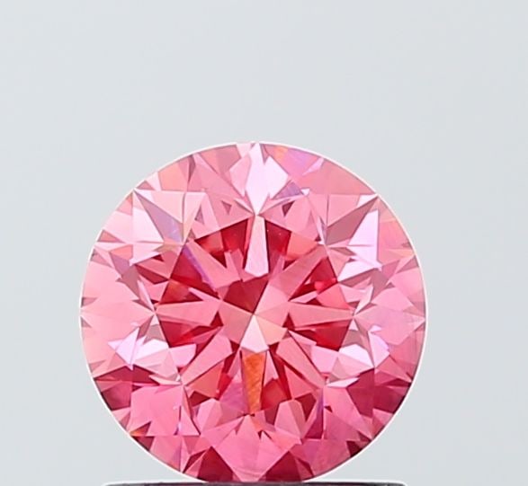Loose Diamond - ROUND 1.15ct Fancy Vivid Pink VS1: Loose Diamond - ROUND 1.15ct Fancy Vivid Pink VS1 Source: This is a real non-mined Diamond that has been grown in a lab Shape: ROUND Carats: 1.15 Color: Fancy Vivid Pink Certification: IGI Video: