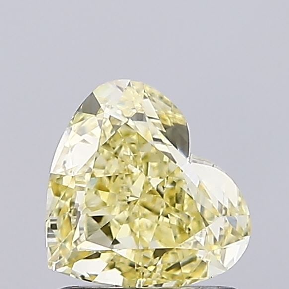 Loose Diamond - HEART 1.04ct Fancy Intense Yellow VS1: Loose Diamond - HEART 1.04ct Fancy Intense Yellow VS1 Source: This is a real non-mined Diamond that has been grown in a lab Shape: HEART Carats: 1.04 Color: Fancy Intense Yellow Certification: IGI