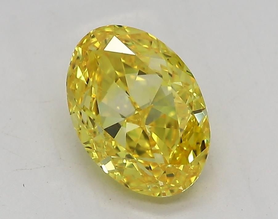 Loose Diamond - OVAL 1.52ct Fancy Vivid Yellow VVS2: Loose Diamond - OVAL 1.52ct Fancy Vivid Yellow VVS2 Source: This is a real non-mined Diamond that has been grown in a lab Shape: OVAL Carats: 1.52 Color: Fancy Vivid Yellow Certification: IGI Video: