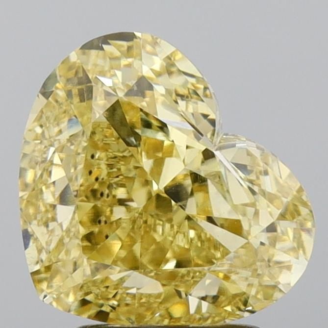 Loose Diamond - HEART 3.06ct Fancy Intense Yellow VS1: Loose Diamond - HEART 3.06ct Fancy Intense Yellow VS1 Source: This is a real non-mined Diamond that has been grown in a lab Shape: HEART Carats: 3.06 Color: Fancy Intense Yellow Certification: IGI Vid