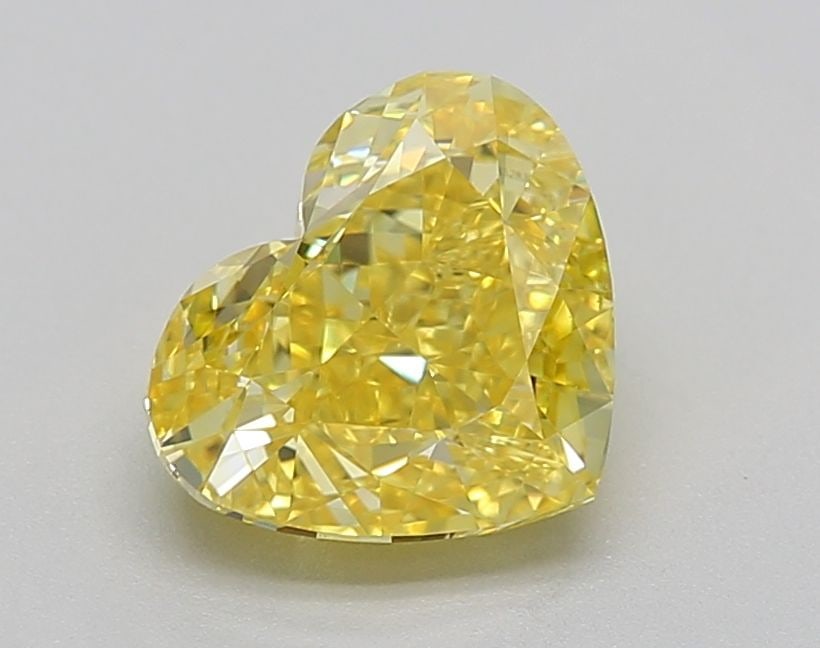 Loose Diamond - HEART 1.56ct Fancy Vivid Yellow VVS2: Loose Diamond - HEART 1.56ct Fancy Vivid Yellow VVS2 Source: This is a real non-mined Diamond that has been grown in a lab Shape: HEART Carats: 1.56 Color: Fancy Vivid Yellow Certification: IGI Video:
