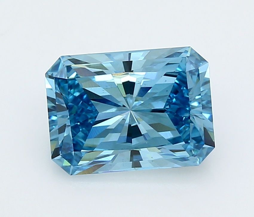 Loose Diamond - RADIANT 3.16ct Fancy Vivid Blue VS1: Loose Diamond - RADIANT 3.16ct Fancy Vivid Blue VS1 Source: This is a real non-mined Diamond that has been grown in a lab Shape: RADIANT Carats: 3.16 Color: Fancy Vivid Blue Certification: IGI Video:
