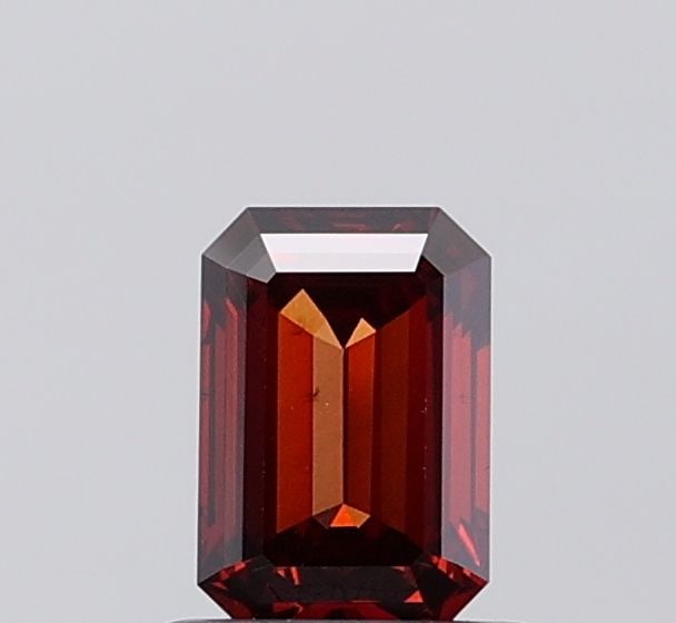 Loose Diamond - EMERALD 0.64ct Fancy Deep Orange VVS2: Loose Diamond - EMERALD 0.64ct Fancy Deep Orange VVS2 Source: This is a real non-mined Diamond that has been grown in a lab Shape: EMERALD Carats: 0.64 Color: Fancy Deep Orange Certification: IGI Vide