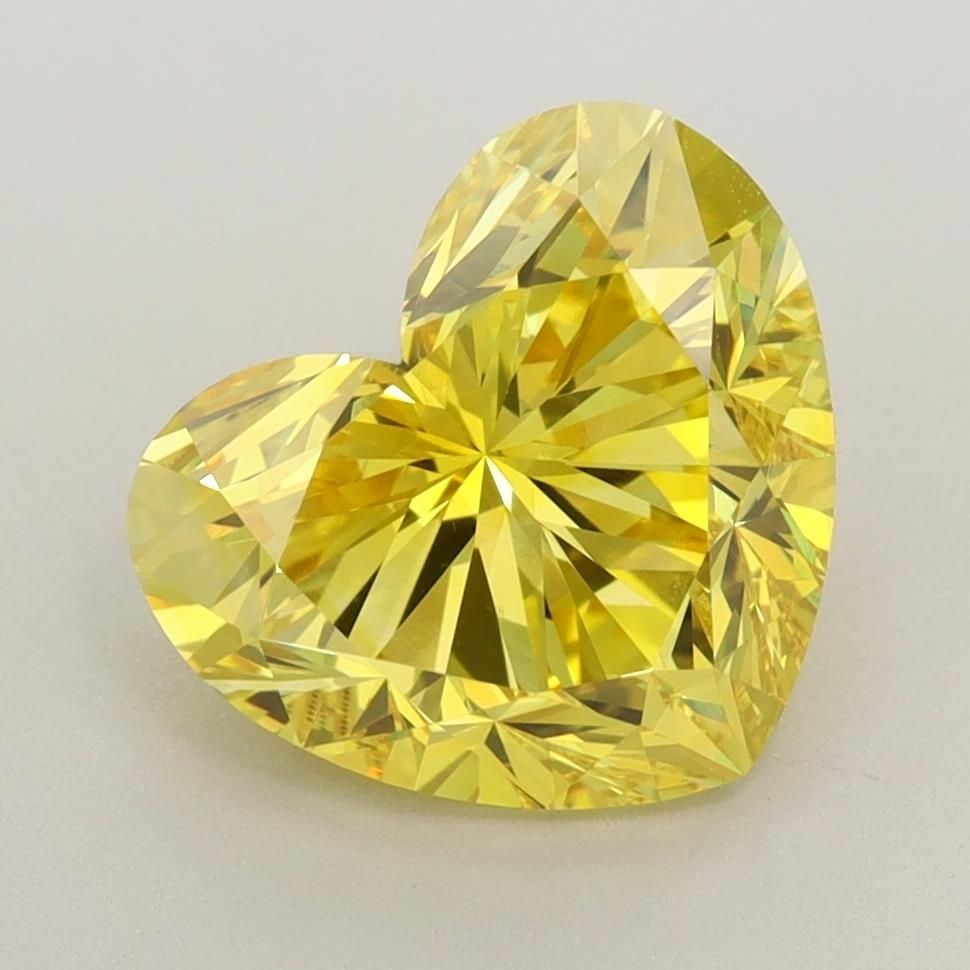 Loose Diamond - HEART 3.11ct Fancy Vivid Yellow VVS2: Loose Diamond - HEART 3.11ct Fancy Vivid Yellow VVS2 Source: This is a real non-mined Diamond that has been grown in a lab Shape: HEART Carats: 3.11 Color: Fancy Vivid Yellow Certification: IGI Video: