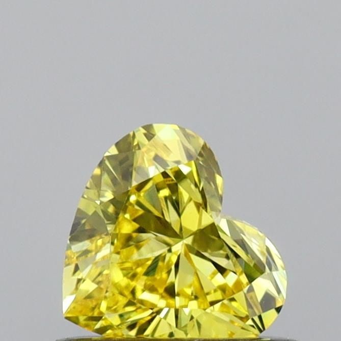 Loose Diamond - HEART 0.4ct Fancy Vivid Yellow VS1: Loose Diamond - HEART 0.4ct Fancy Vivid Yellow VS1 Source: This is a real non-mined Diamond that has been grown in a lab Shape: HEART Carats: 0.4 Color: Fancy Vivid Yellow Certification: IGI Video: