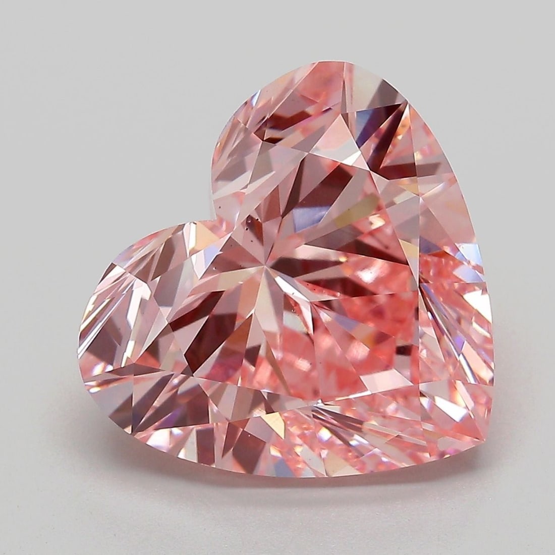 Loose Diamond - HEART 8.0ct Fancy Vivid Pink VS2: Loose Diamond - HEART 8.0ct Fancy Vivid Pink VS2 Source: This is a real non-mined Diamond that has been grown in a lab Shape: HEART Carats: 8.0 Color: Fancy Vivid Pink Certification: IGI Video: