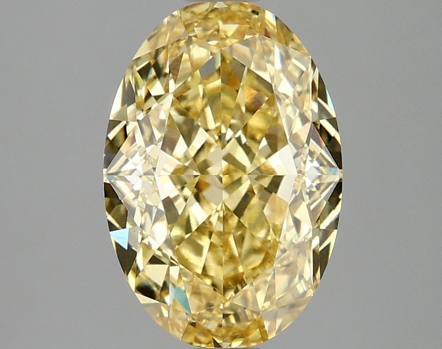 Loose Diamond - OVAL 3.09ct Fancy Intense Yellow VS1: Loose Diamond - OVAL 3.09ct Fancy Intense Yellow VS1 Source: This is a real non-mined Diamond that has been grown in a lab Shape: OVAL Carats: 3.09 Color: Fancy Intense Yellow Certification: IGI Video
