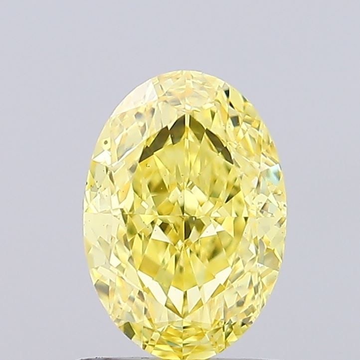 Loose Diamond - OVAL 1.08ct Fancy Vivid Yellow VS1: Loose Diamond - OVAL 1.08ct Fancy Vivid Yellow VS1 Source: This is a real non-mined Diamond that has been grown in a lab Shape: OVAL Carats: 1.08 Color: Fancy Vivid Yellow Certification: IGI Video: