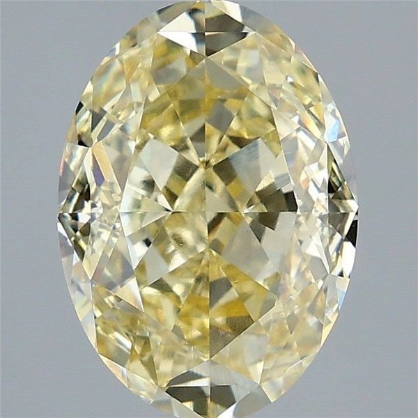 Loose Diamond - OVAL 4.1ct Fancy Yellow VVS2: Loose Diamond - OVAL 4.1ct Fancy Yellow VVS2 Source: This is a real non-mined Diamond that has been grown in a lab Shape: OVAL Carats: 4.1 Color: Fancy Yellow Certification: IGI Video: