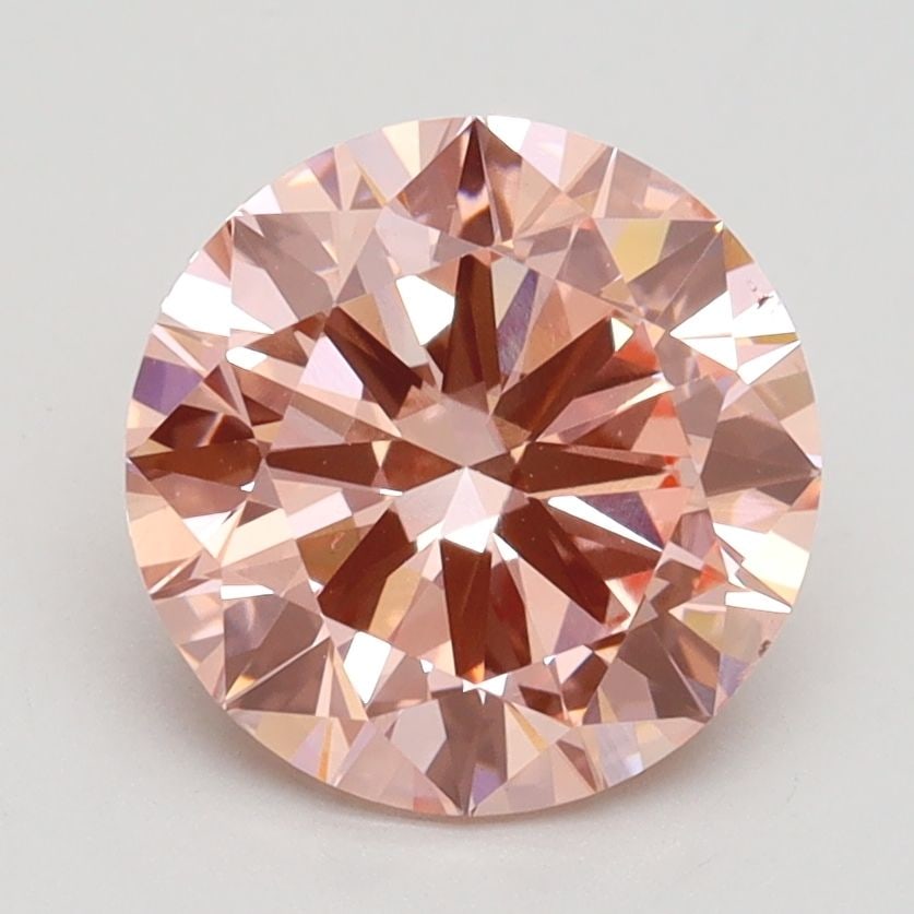 Loose Diamond - ROUND 2.3ct Fancy Vivid Pink VS2: Loose Diamond - ROUND 2.3ct Fancy Vivid Pink VS2 Source: This is a real non-mined Diamond that has been grown in a lab Shape: ROUND Carats: 2.3 Color: Fancy Vivid Pink Certification: IGI Video: