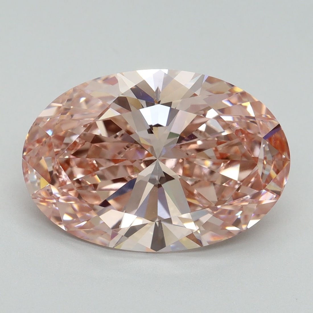 Loose Diamond - OVAL 6.06ct Fancy Vivid Pink VVS2: Loose Diamond - OVAL 6.06ct Fancy Vivid Pink VVS2 Source: This is a real non-mined Diamond that has been grown in a lab Shape: OVAL Carats: 6.06 Color: Fancy Vivid Pink Certification: IGI Video: