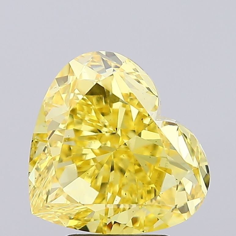 Loose Diamond - HEART 6.08ct Fancy Vivid Yellow VS2: Loose Diamond - HEART 6.08ct Fancy Vivid Yellow VS2 Source: This is a real non-mined Diamond that has been grown in a lab Shape: HEART Carats: 6.08 Color: Fancy Vivid Yellow Certification: IGI Video: