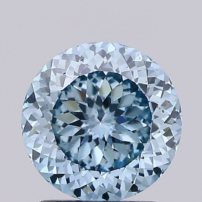Loose Diamond - ROUND 2.01ct Fancy Vivid Blue VS2: Loose Diamond - ROUND 2.01ct Fancy Vivid Blue VS2 Source: This is a real non-mined Diamond that has been grown in a lab Shape: ROUND Carats: 2.01 Color: Fancy Vivid Blue Certification: IGI Video:
