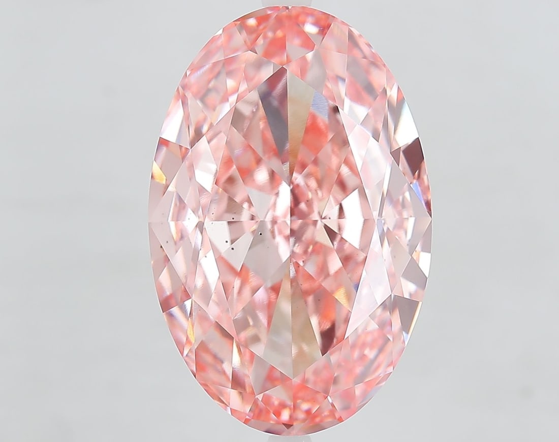 Loose Diamond - OVAL 15.4ct Fancy Vivid Pink VS2: Loose Diamond - OVAL 15.4ct Fancy Vivid Pink VS2 Source: This is a real non-mined Diamond that has been grown in a lab Shape: OVAL Carats: 15.4 Color: Fancy Vivid Pink Certification: IGI Video: