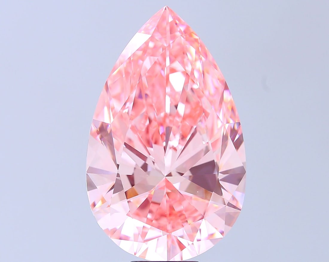 Loose Diamond - PEAR 15.08ct Fancy Vivid Pink VVS2: Loose Diamond - PEAR 15.08ct Fancy Vivid Pink VVS2 Source: This is a real non-mined Diamond that has been grown in a lab Shape: PEAR Carats: 15.08 Color: Fancy Vivid Pink Certification: IGI Video: