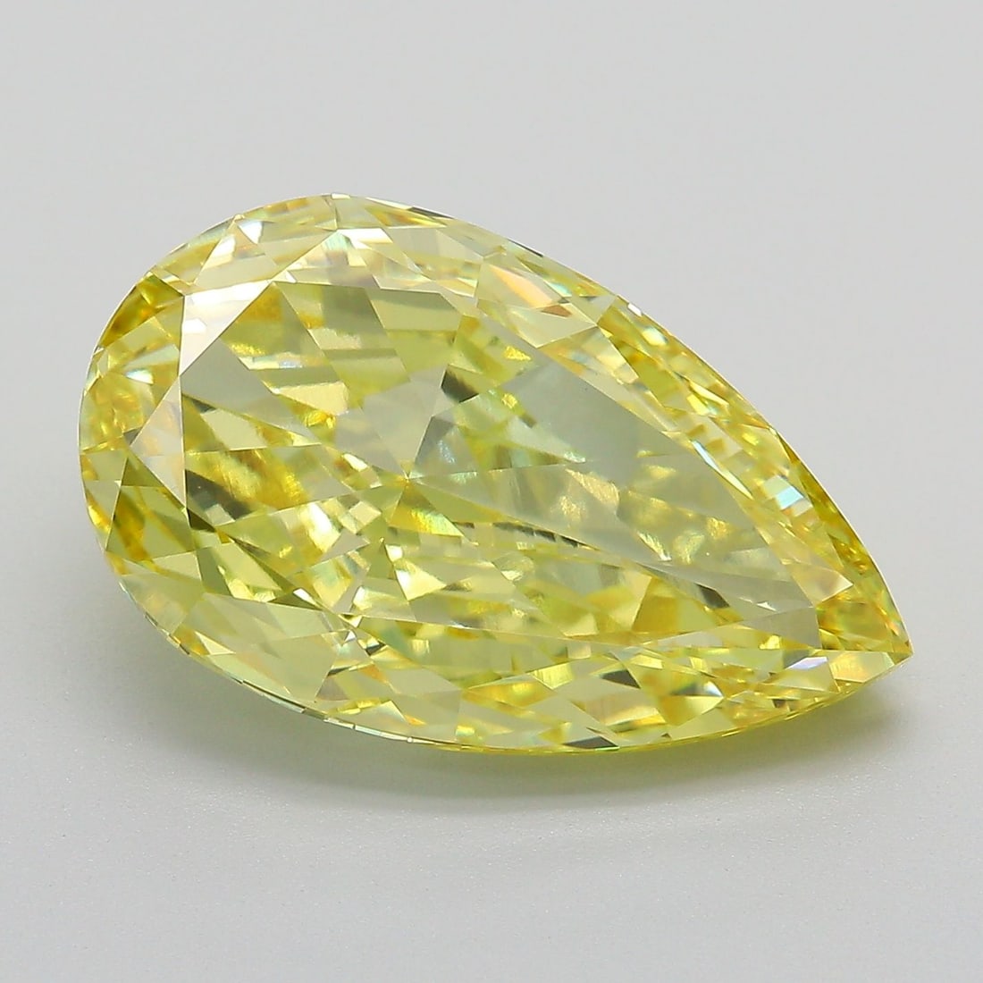 Loose Diamond - PEAR 8.03ct Fancy Vivid Yellow VVS2: Loose Diamond - PEAR 8.03ct Fancy Vivid Yellow VVS2 Source: This is a real non-mined Diamond that has been grown in a lab Shape: PEAR Carats: 8.03 Color: Fancy Vivid Yellow Certification: IGI The Diam