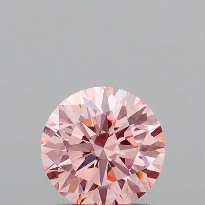 Ideal Loose Diamond - ROUND 1.1ct Fancy Intense Pink VVS2: Ideal Loose Diamond - ROUND 1.1ct Fancy Intense Pink VVS2 Source: This is a real non-mined Diamond that has been grown in a lab Shape: ROUND Carats: 1.1 Color: Fancy Intense Pink Certification: IGI Vi
