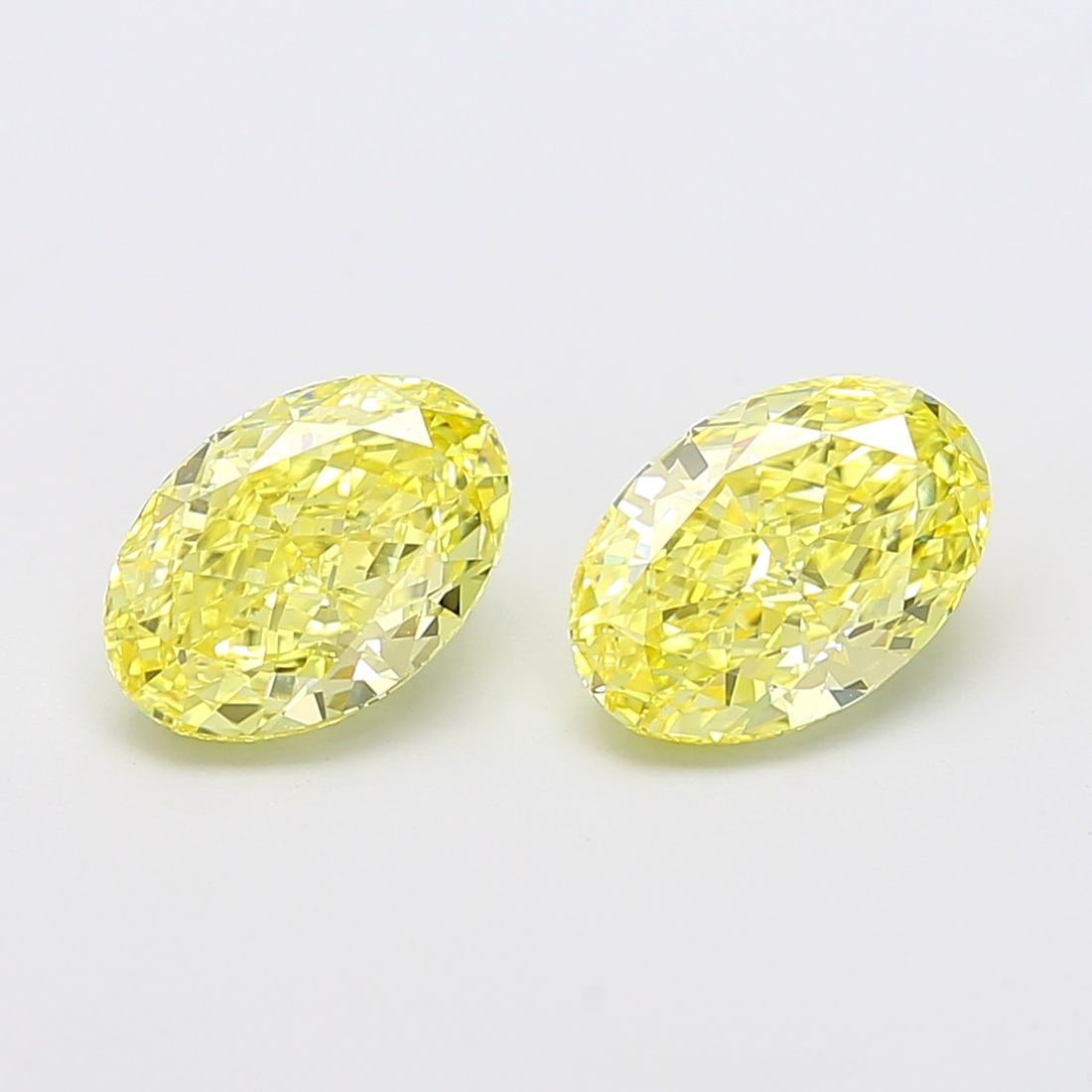 Loose Diamond - OVAL 2.02ct Fancy Intense Yellow VVS2: Loose Diamond - OVAL 2.02ct Fancy Intense Yellow VVS2 Source: This is a real non-mined Diamond that has been grown in a lab Shape: OVAL Carats: 2.02 Color: Fancy Intense Yellow Certification: IGI Vide