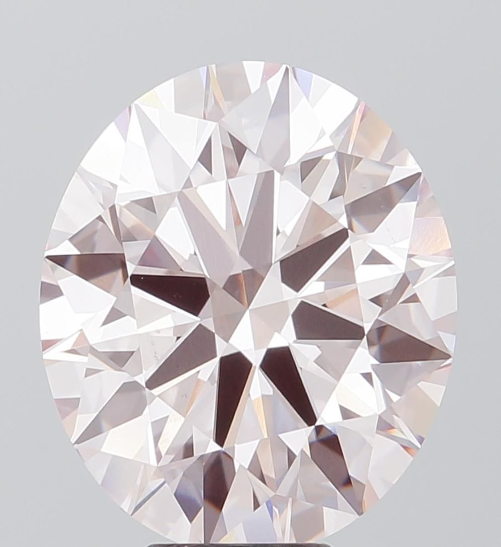 Loose Diamond - ROUND 6.74ct Fancy Pink VS1: Loose Diamond - ROUND 6.74ct Fancy Pink VS1 Source: This is a real non-mined Diamond that has been grown in a lab Shape: ROUND Carats: 6.74 Color: Fancy Pink Certification: IGI Video:
