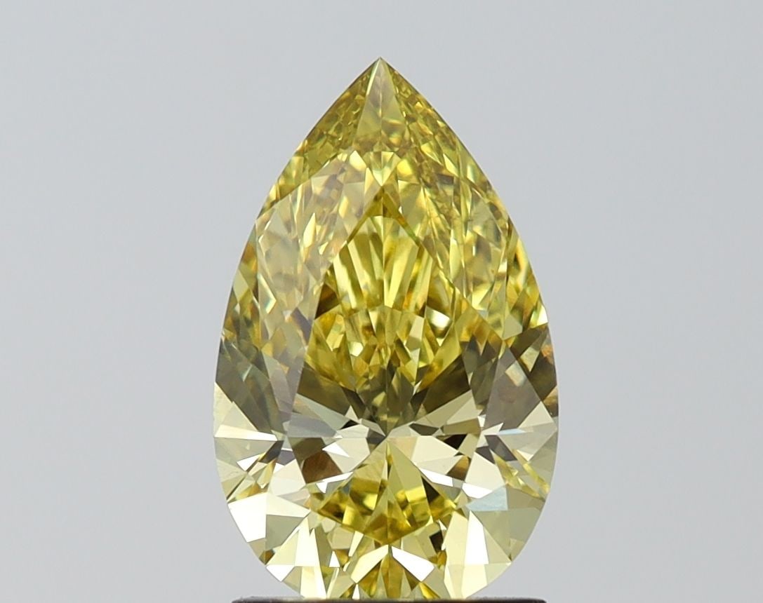 Loose Diamond - PEAR 2.2ct Fancy Yellow VS1: Loose Diamond - PEAR 2.2ct Fancy Yellow VS1 Source: This is a real non-mined Diamond that has been grown in a lab Shape: PEAR Carats: 2.2 Color: Fancy Yellow Certification: IGI Video: