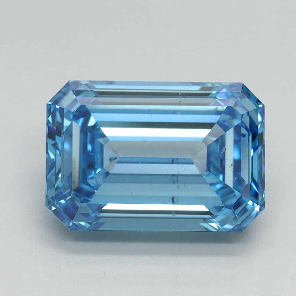 Loose Diamond - EMERALD 3.01ct Fancy Vivid Blue VS2: Loose Diamond - EMERALD 3.01ct Fancy Vivid Blue VS2 Source: This is a real non-mined Diamond that has been grown in a lab Shape: EMERALD Carats: 3.01 Color: Fancy Vivid Blue Certification: IGI Video: