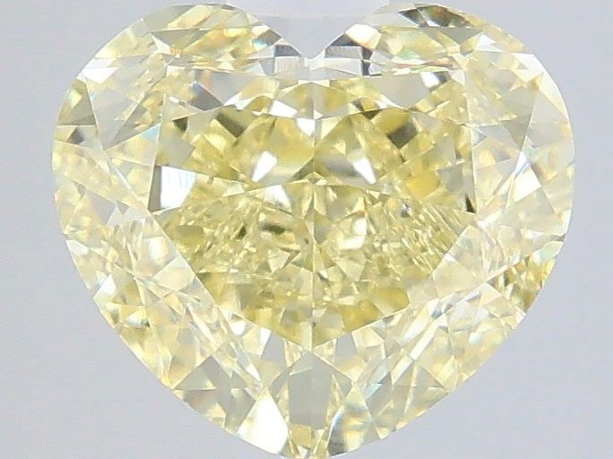 Loose Diamond - HEART 3.6ct Fancy Yellow VVS2: Loose Diamond - HEART 3.6ct Fancy Yellow VVS2 Source: This is a real non-mined Diamond that has been grown in a lab Shape: HEART Carats: 3.6 Color: Fancy Yellow Certification: IGI Video: