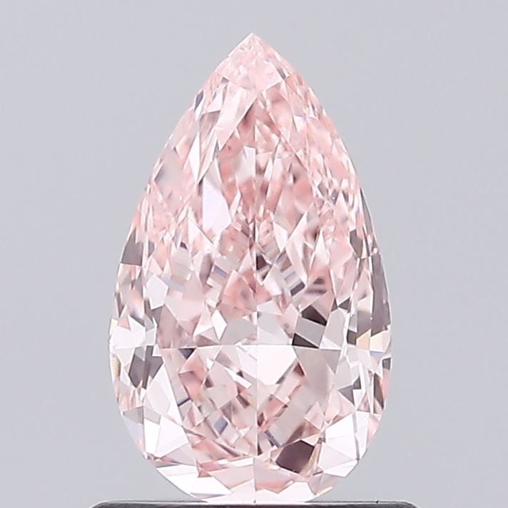 Loose Diamond - PEAR 0.91ct Fancy Vivid Pink VVS2: Loose Diamond - PEAR 0.91ct Fancy Vivid Pink VVS2 Source: This is a real non-mined Diamond that has been grown in a lab Shape: PEAR Carats: 0.91 Color: Fancy Vivid Pink Certification: IGI Video: